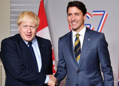 خبرنگاران انگلیس و کانادا توافقنامه تجاری امضاء کردند